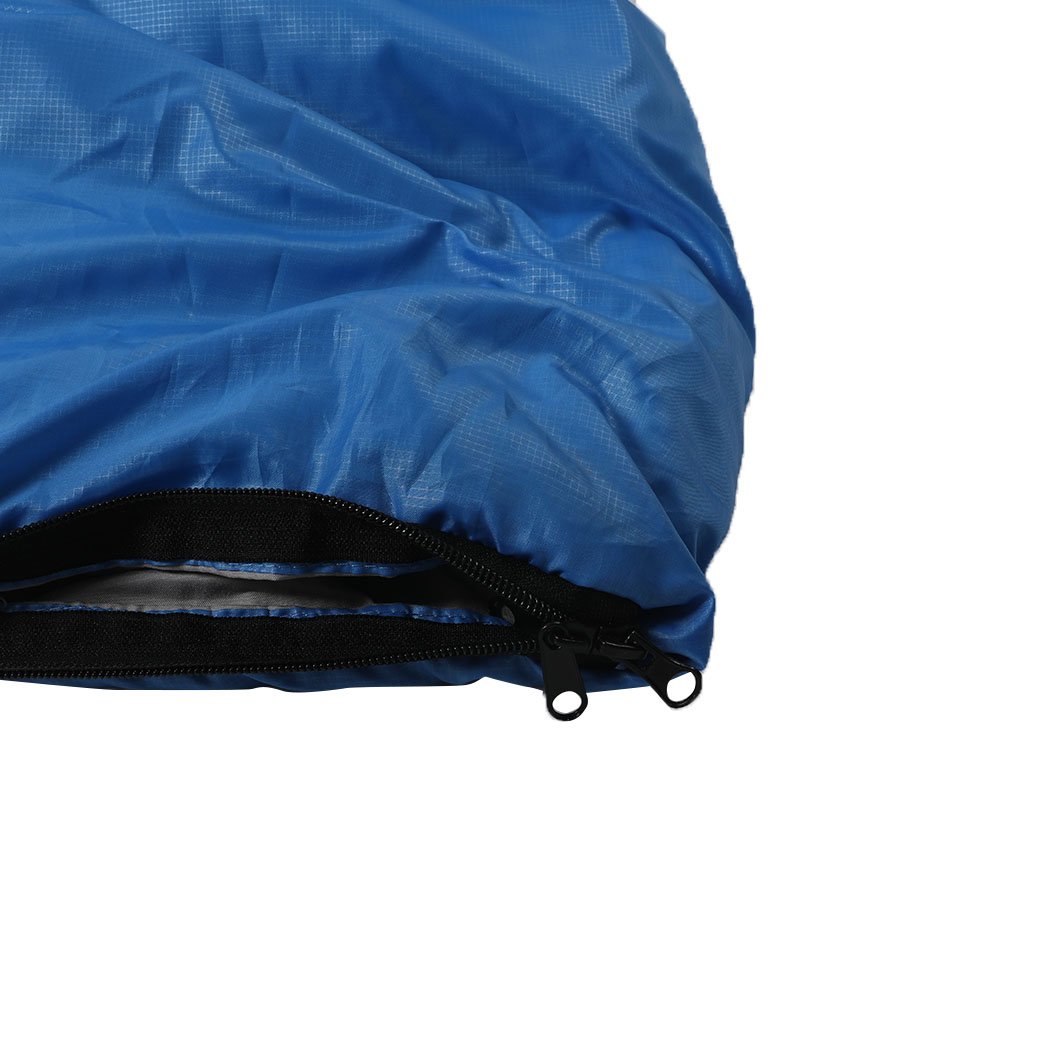 Blue sleeping bag designed for outdoor camping and hiking, featuring a water-repellent exterior and comfortable hollow cotton filling.