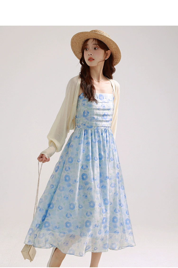 A charming blue suspender skirt featuring a playful bunny print, perfect for summer wear.