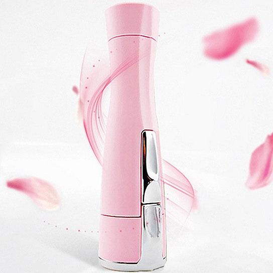 Smooth And Silky Ouchless Portable Ladies Hair Trimmer in pink, compact design with built-in light for precision trimming.