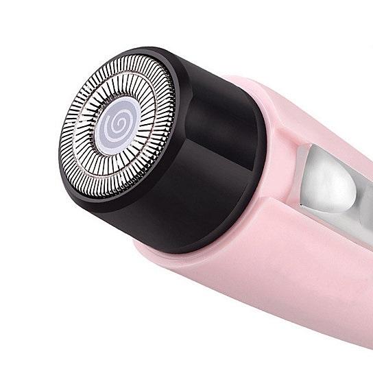 Smooth And Silky Ouchless Portable Ladies Hair Trimmer in pink, compact design with built-in light for precision trimming.