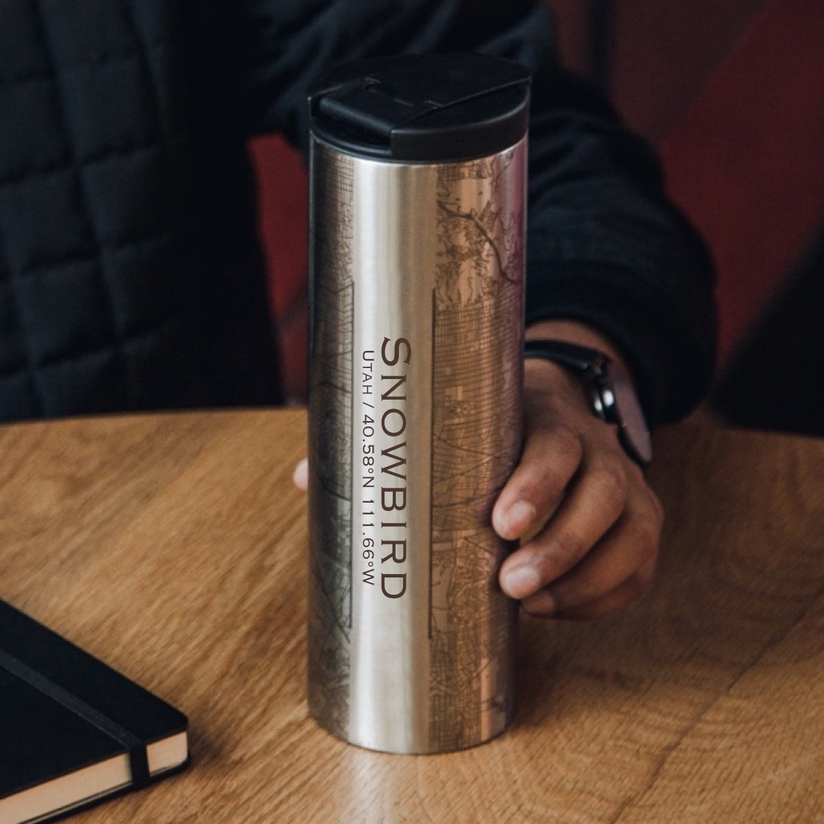 Custom engraved stainless steel coffee tumbler featuring a detailed map of Snowbird, Utah with coordinates.