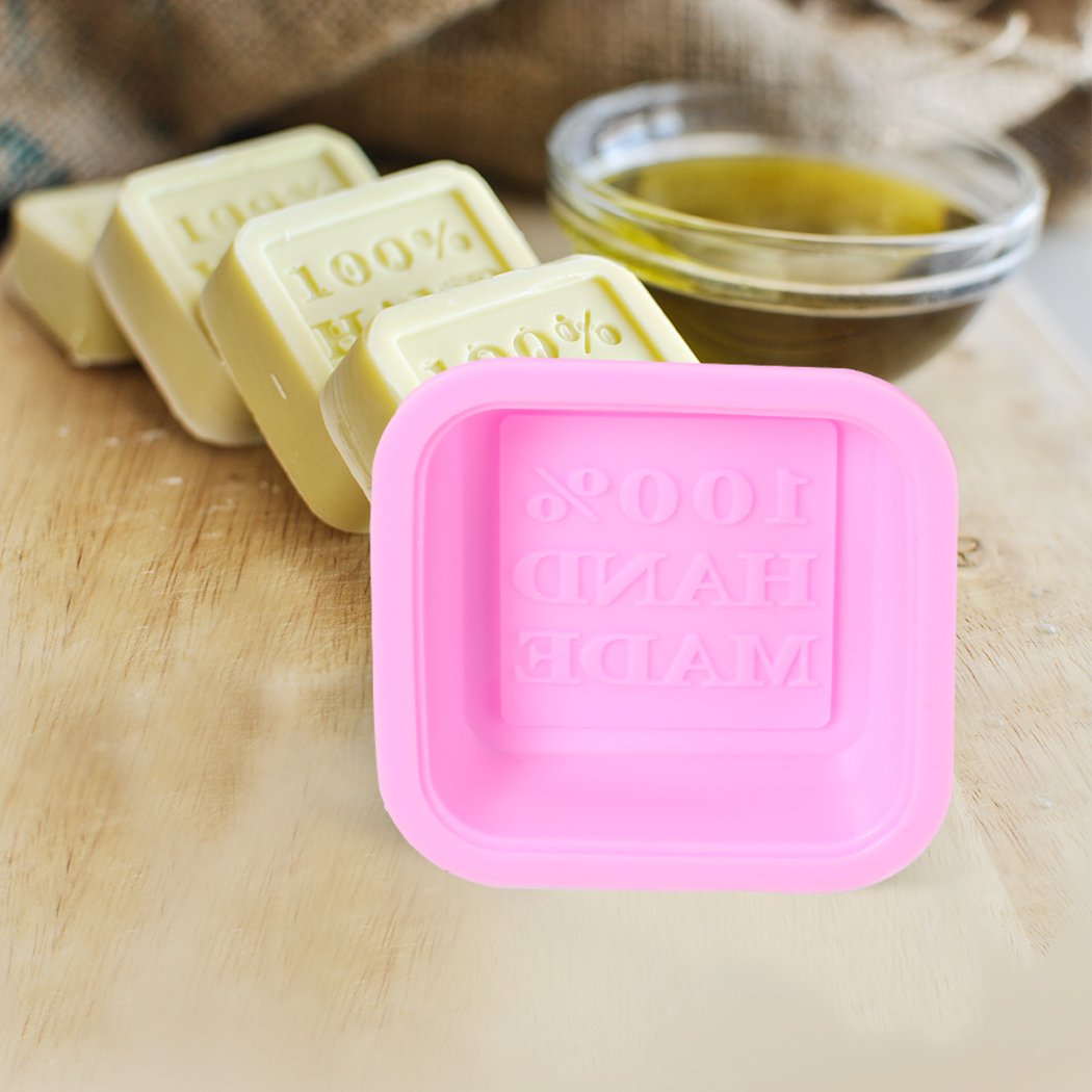 A set of 25 pink silicone soap moulds in square shape, featuring a unique 3D design for detailed soap crafting.