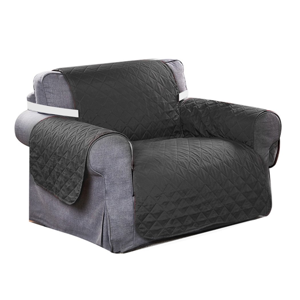 Grey quilted sofa cover protector, waterproof and stylish, designed for comfort and durability.