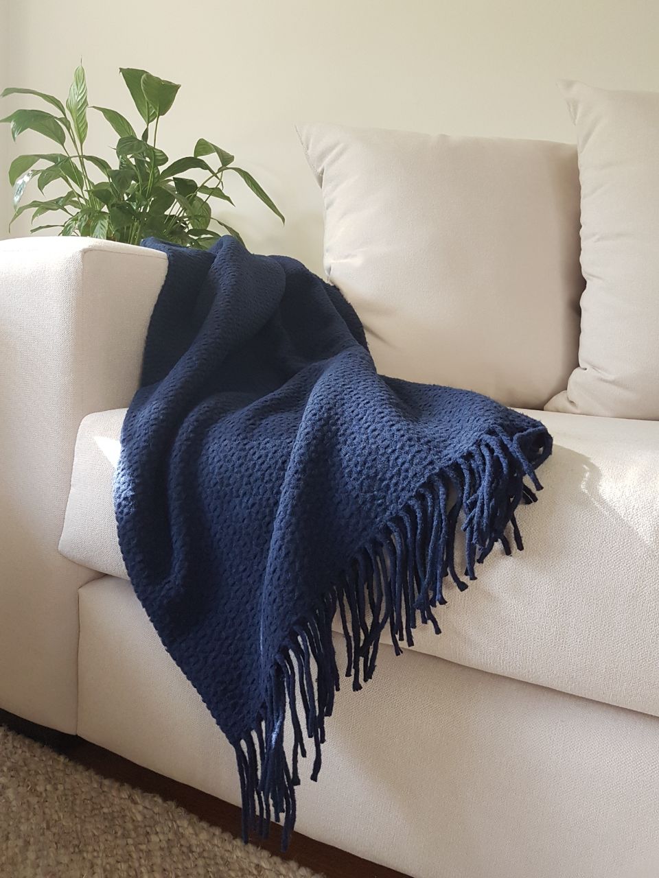 Soho Throw Blanket in Navy, a luxurious wool blend throw showcasing elegant design and soft texture, perfect for cozy living spaces.