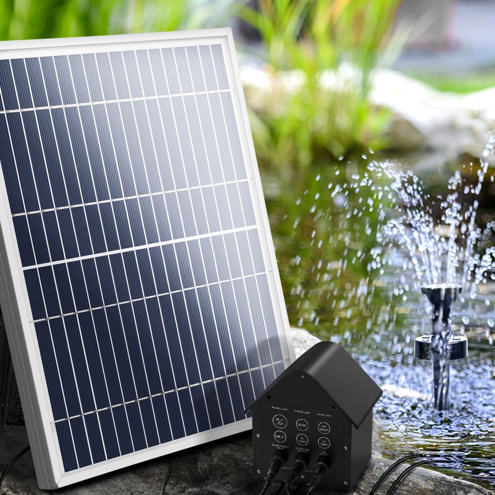 Solar Pond Pump with Battery Powered Submersible Kit featuring LED lights, showcasing a beautiful water fountain in a garden setting.