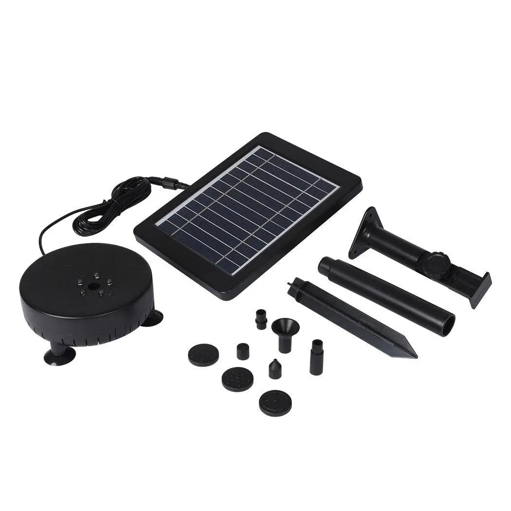 Solar powered water fountain pump with adjustable solar panel and multiple nozzles, set in a serene garden environment.