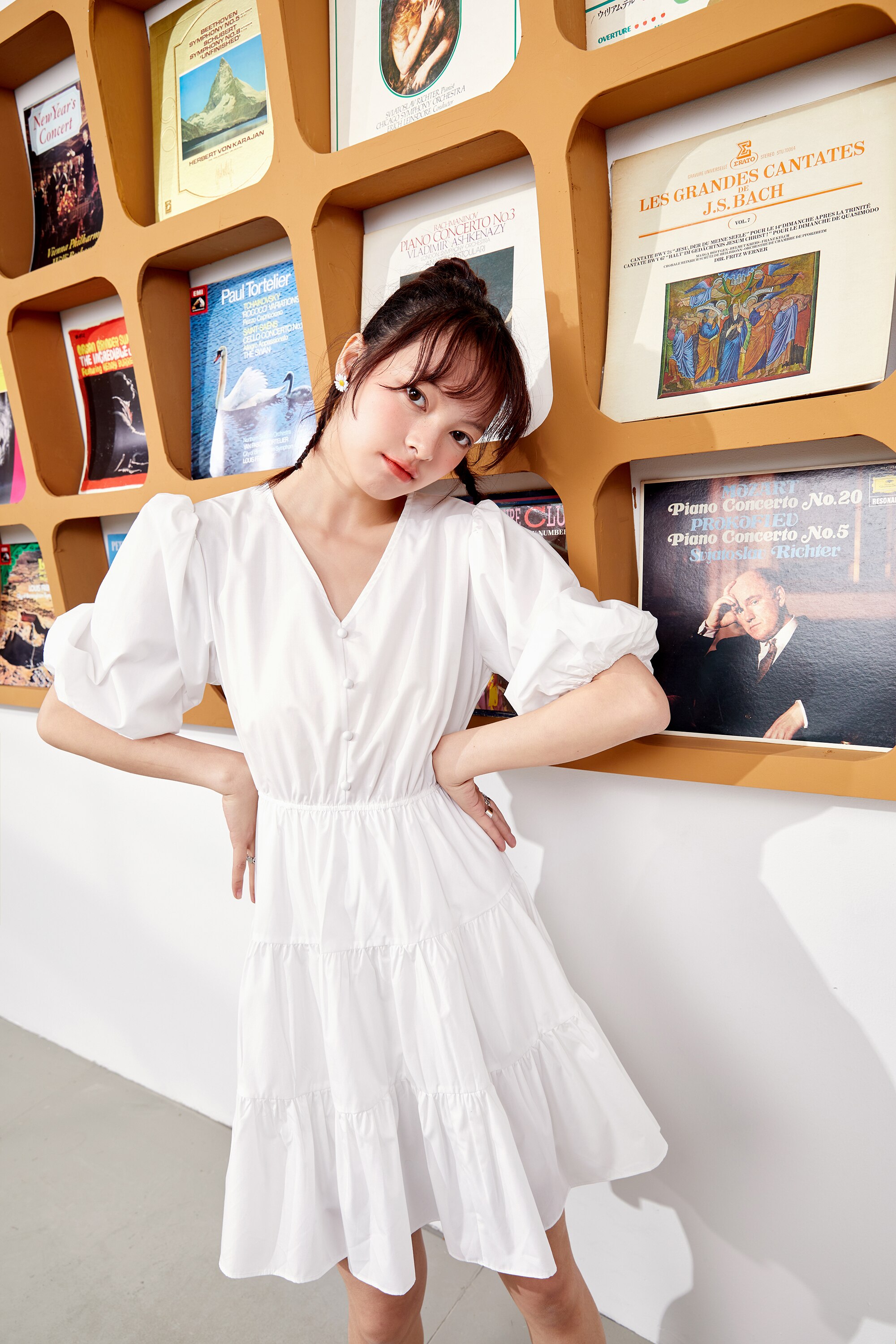 A stylish Solid Pure Casual Midi Ruffle Dress for women featuring vintage lantern sleeves, knee-length cut, and available in pink and white colors.