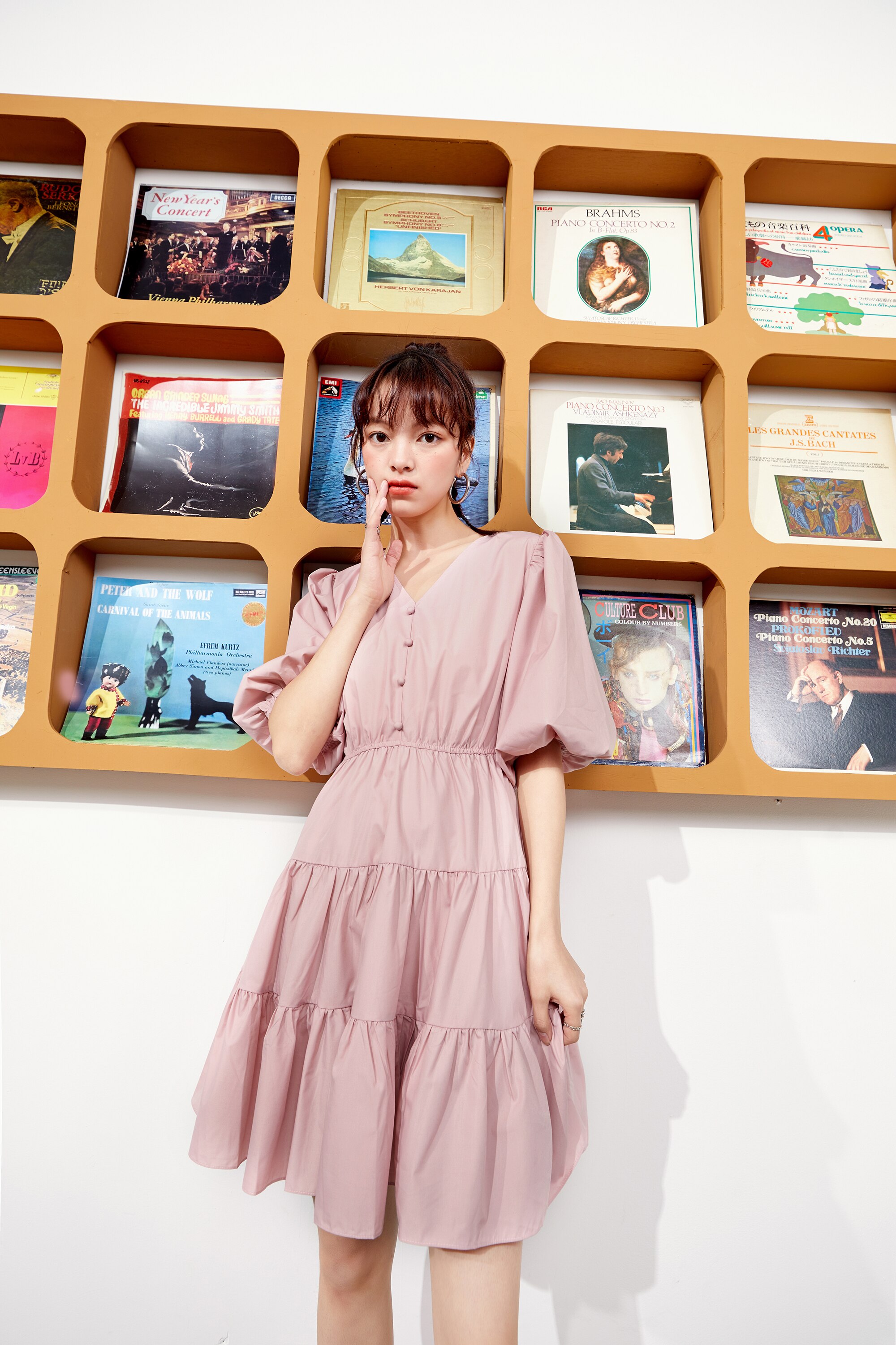 A stylish Solid Pure Casual Midi Ruffle Dress for women featuring vintage lantern sleeves, knee-length cut, and available in pink and white colors.