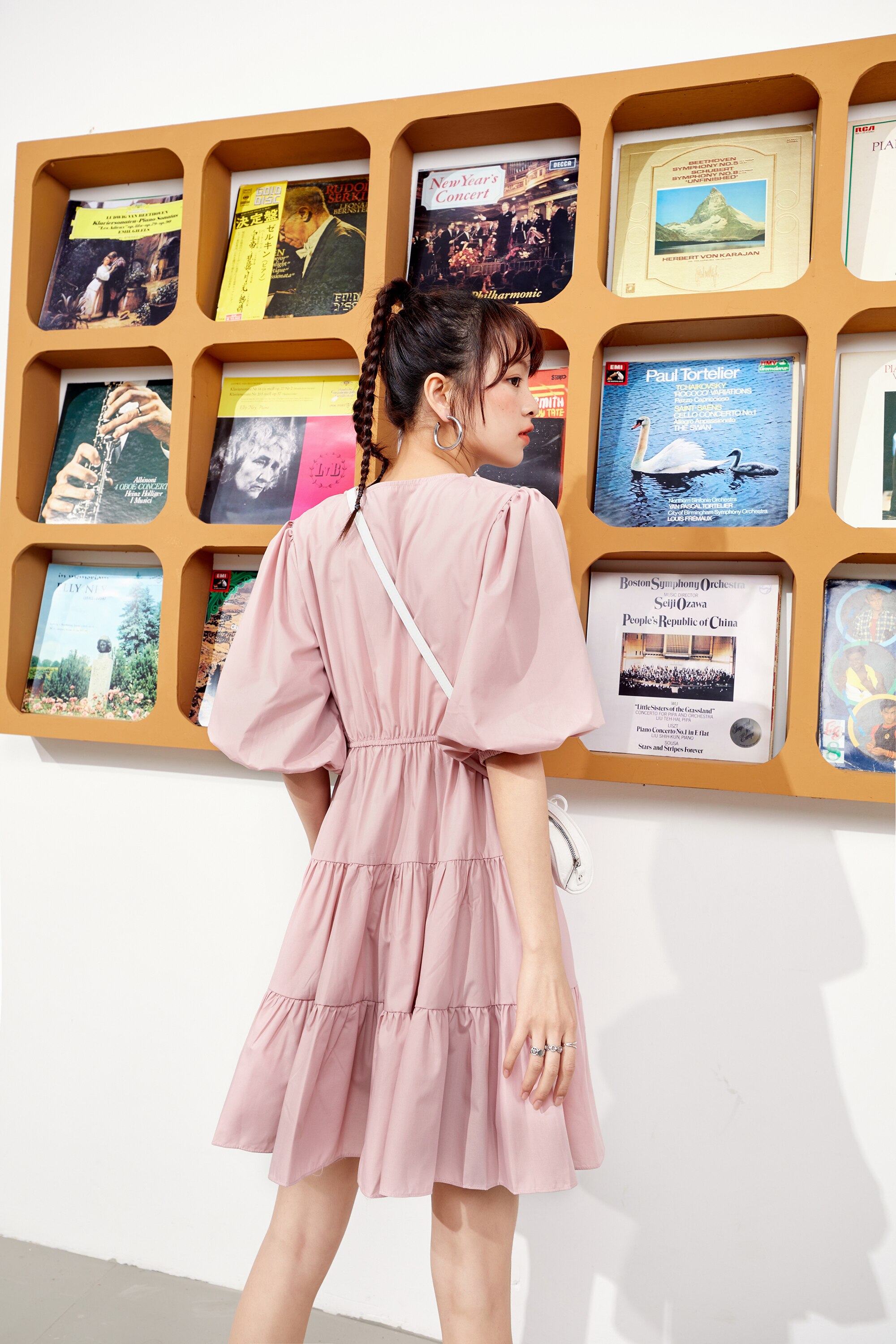 A stylish Solid Pure Casual Midi Ruffle Dress for women featuring vintage lantern sleeves, knee-length cut, and available in pink and white colors.