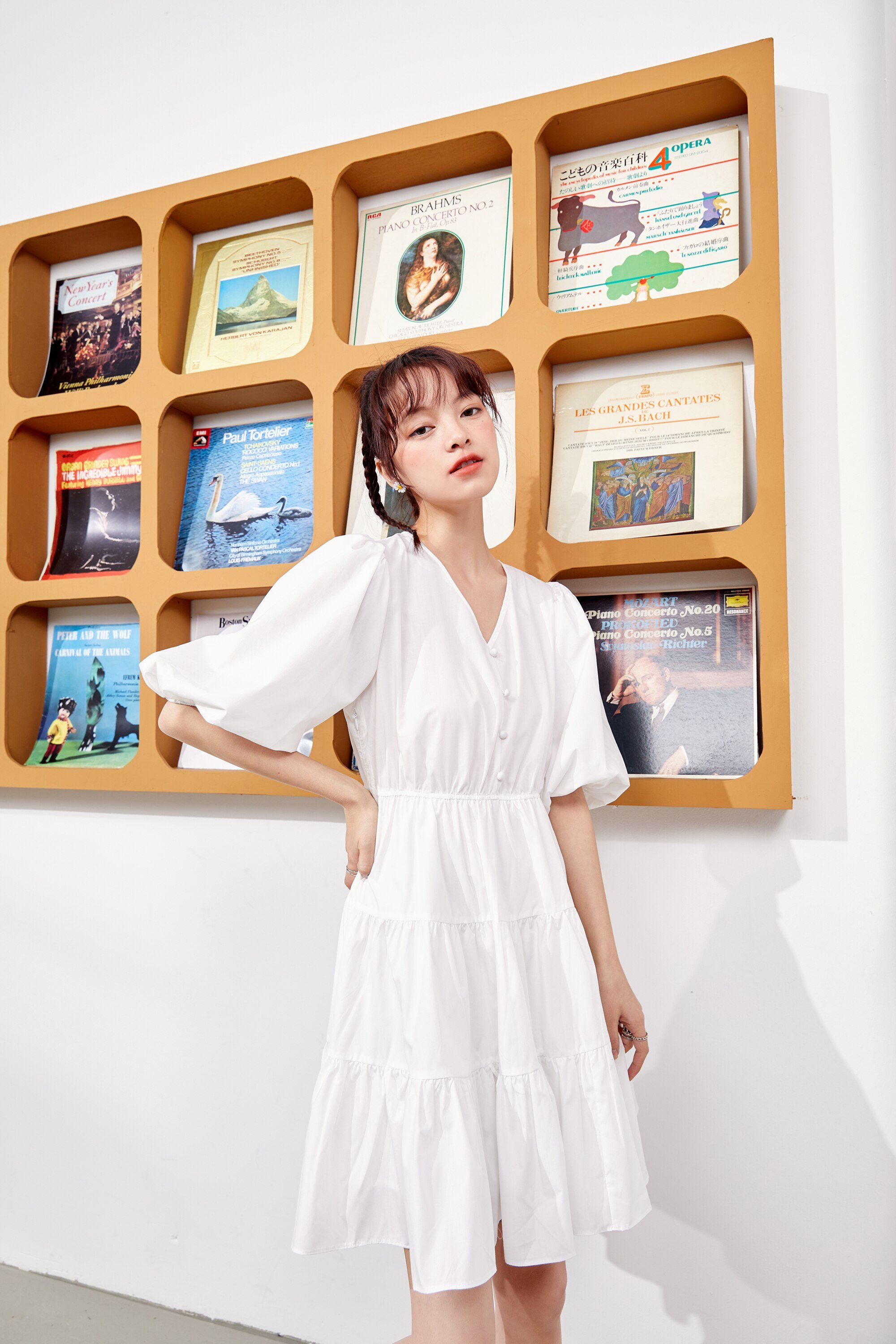 A stylish Solid Pure Casual Midi Ruffle Dress for women featuring vintage lantern sleeves, knee-length cut, and available in pink and white colors.