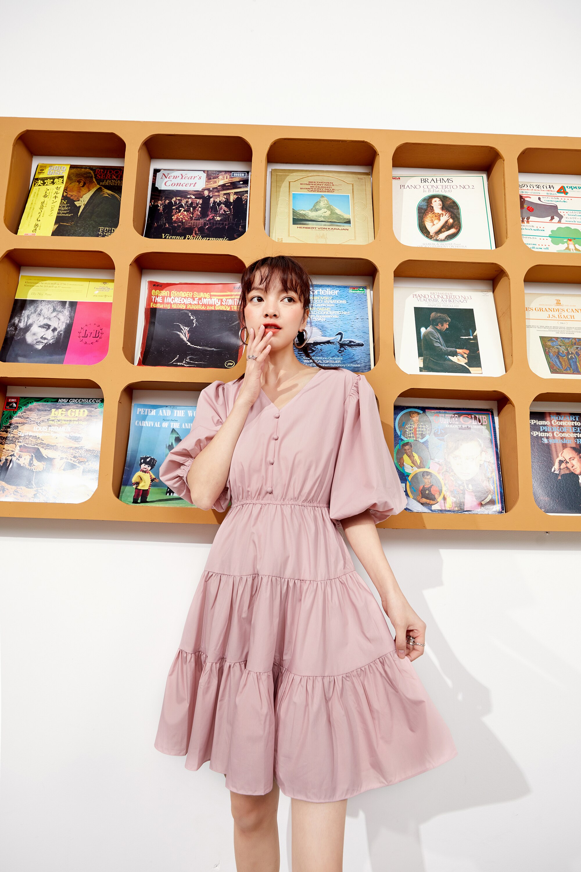 A stylish Solid Pure Casual Midi Ruffle Dress for women featuring vintage lantern sleeves, knee-length cut, and available in pink and white colors.