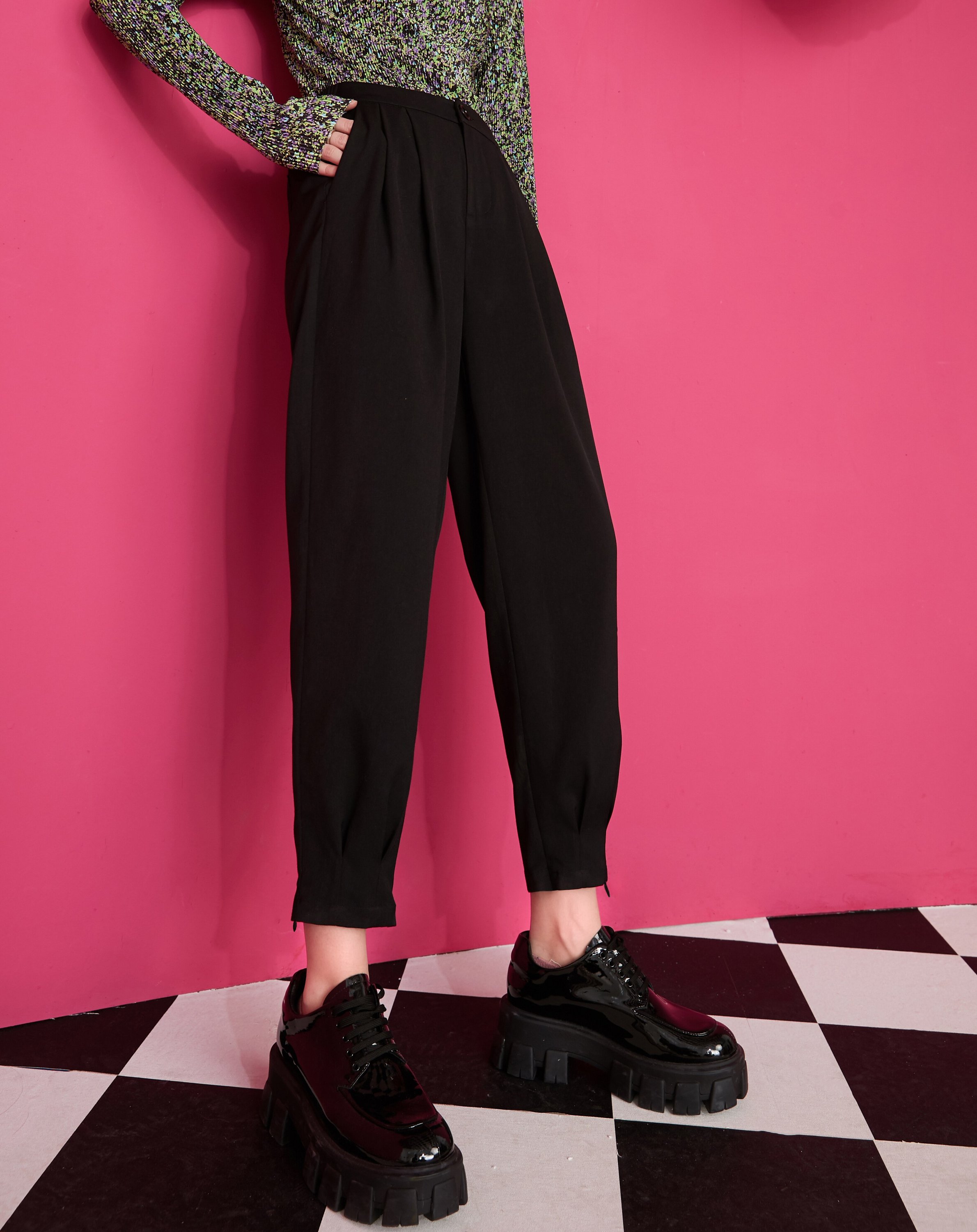 A pair of solid black high waist straight casual pants for women, featuring pockets and made from polyester, perfect for spring and autumn wear.