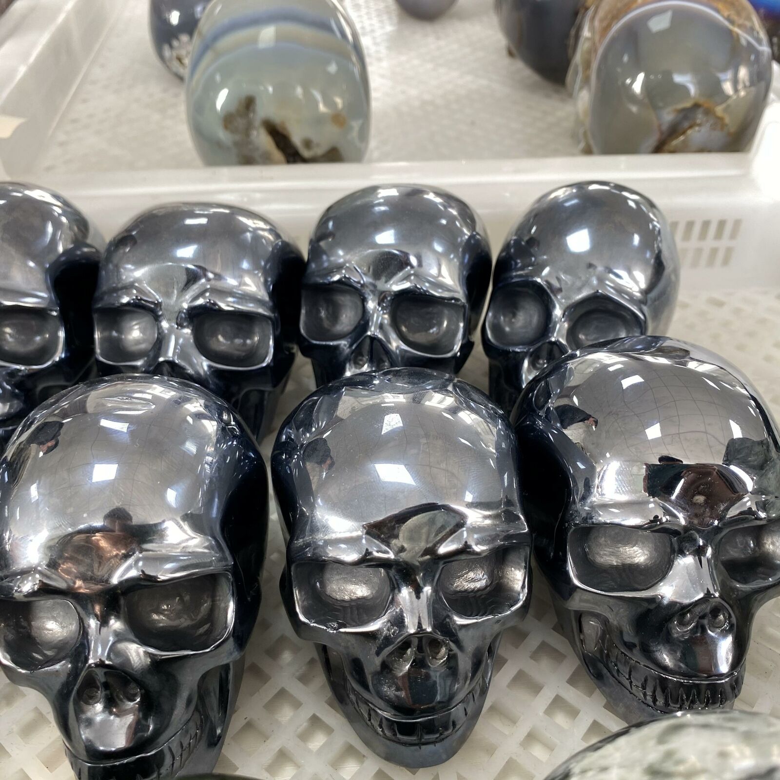 Hand-carved Solid Titanium Metal Skull showcasing intricate details and natural metallic finish, ideal for spiritual practices.