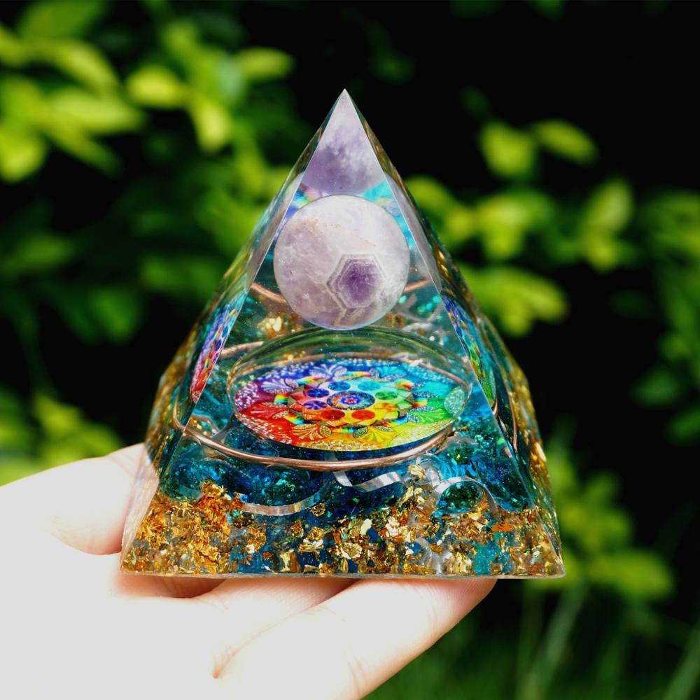 Spiritual Energy Orgone Crystal Pyramid featuring Amethyst crystal, blue cloud, and gold foil patterns.