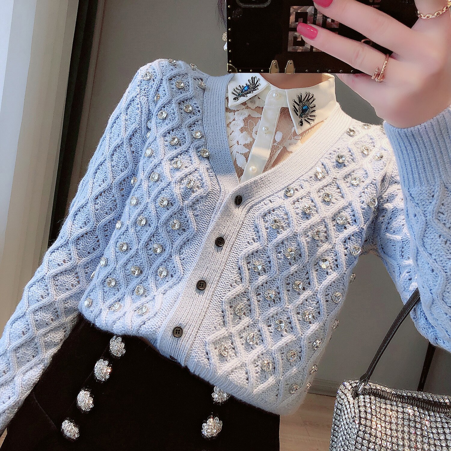 A stylish short women knit jacket featuring a V-neck, rhinestone details, and an argyle pattern, perfect for spring and autumn wear.