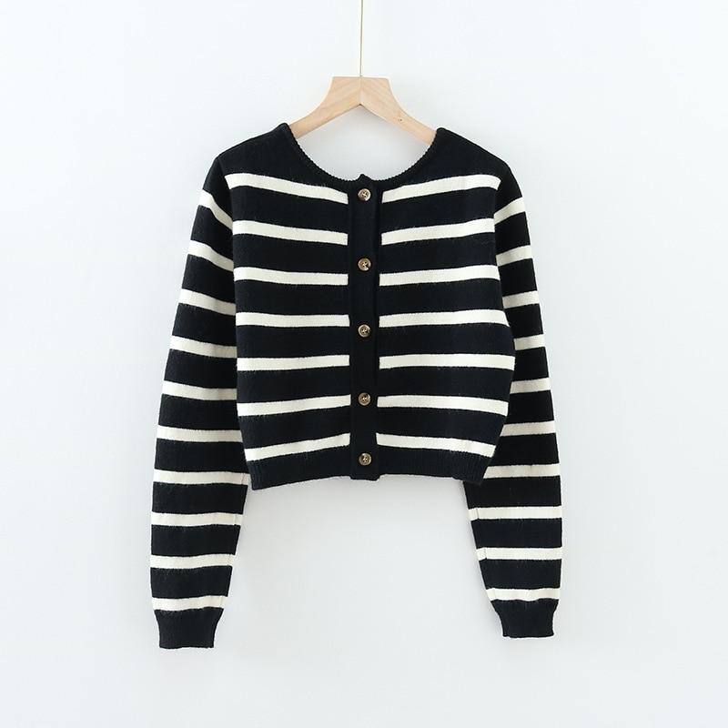 A stylish black and white striped cropped cardigan with long sleeves, perfect for casual spring and autumn wear.