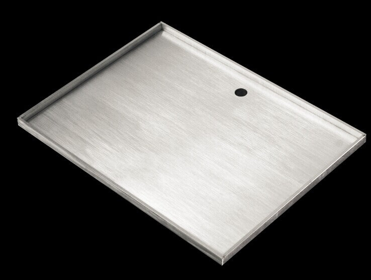 A high-quality stainless steel BBQ hot plate with folded sides and tapered drain hole, perfect for outdoor grilling.