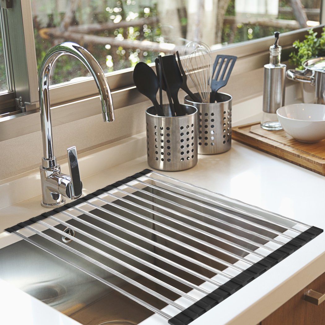 Foldable stainless steel sink dish drainer roll-up drying rack, showcasing its sleek design and functionality in a modern kitchen setting.