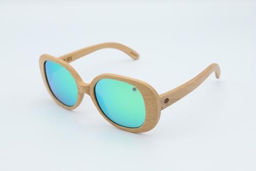 Stylish Star Sunglasses featuring oversized round frames made from premium zebra wood with green polarized lenses.