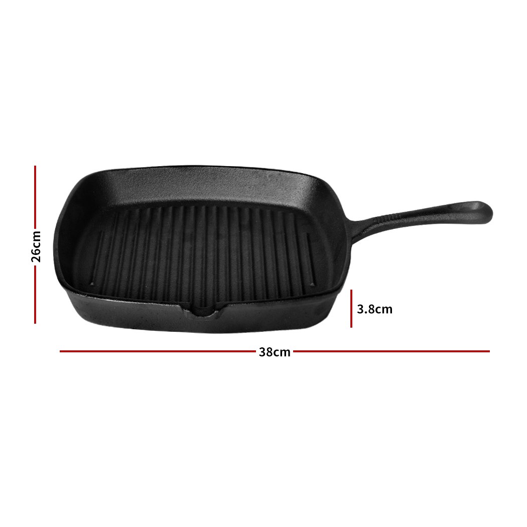 A sleek grey Steak Frying Pan made of FDA cast iron, featuring a non-stick ribbed surface and an anti-slip handle, ideal for gas and induction cookers.