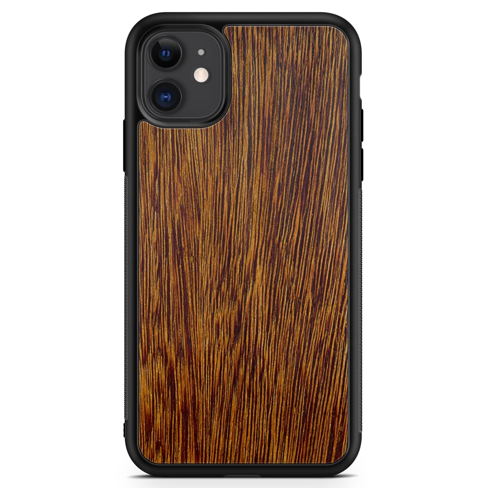 Sucupira wooden phone case held in hand, showcasing its unique grain and finish.