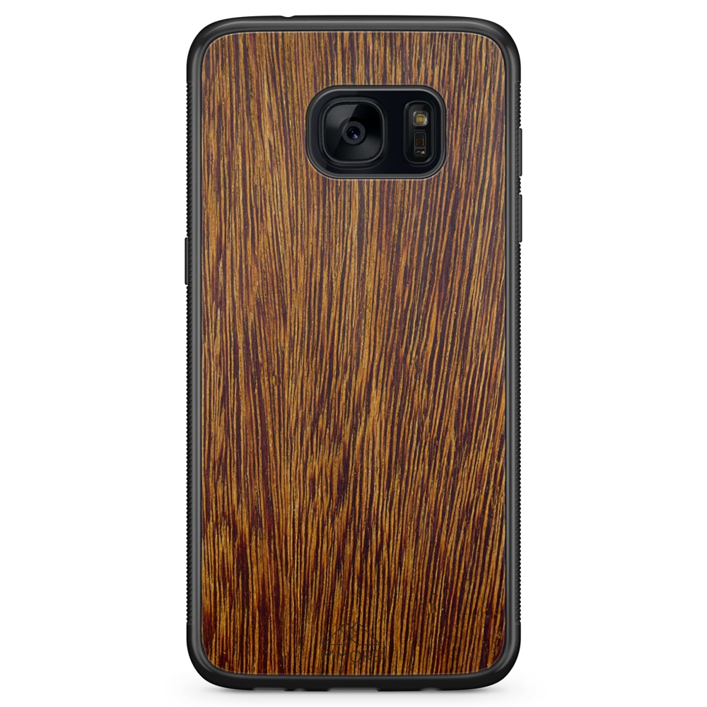 Sucupira wooden phone case held in hand, showcasing its unique grain and finish.