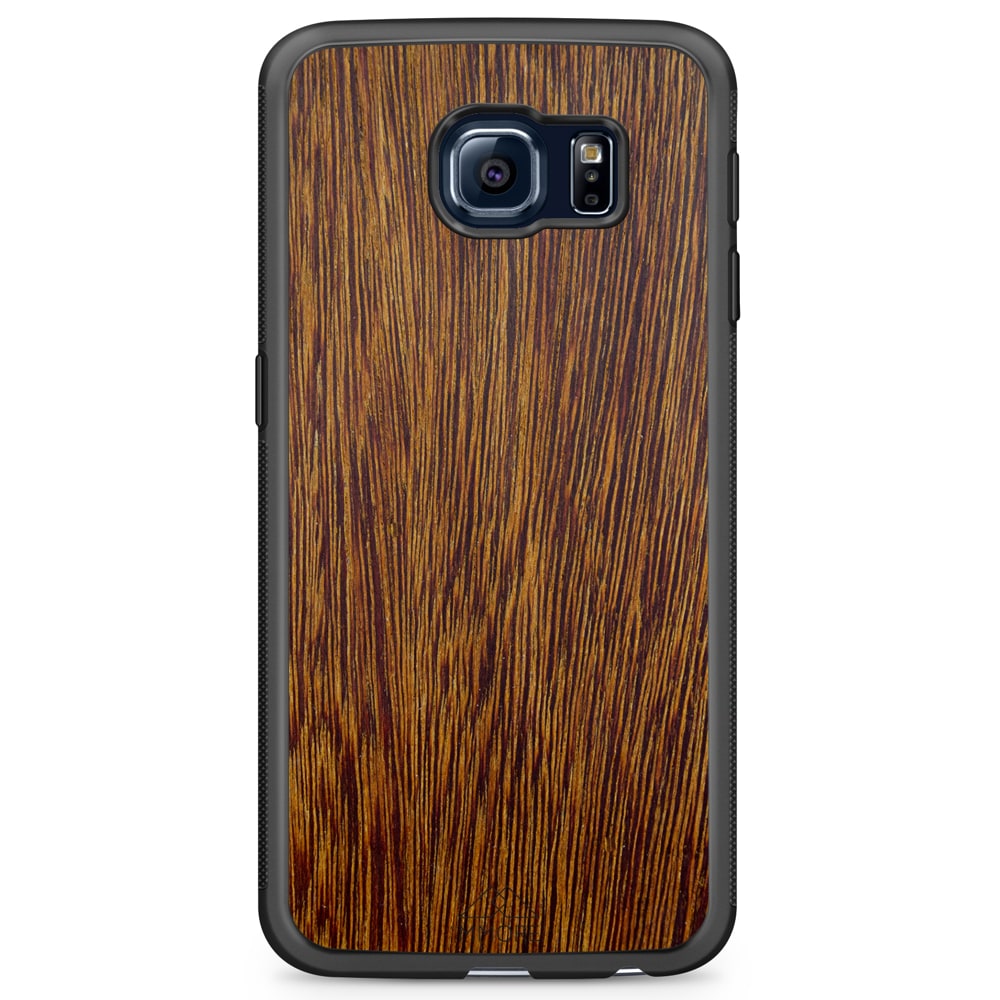 Sucupira wooden phone case held in hand, showcasing its unique grain and finish.