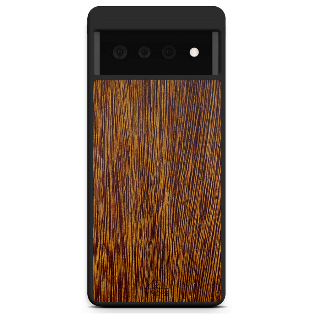 Sucupira wooden phone case held in hand, showcasing its unique grain and finish.