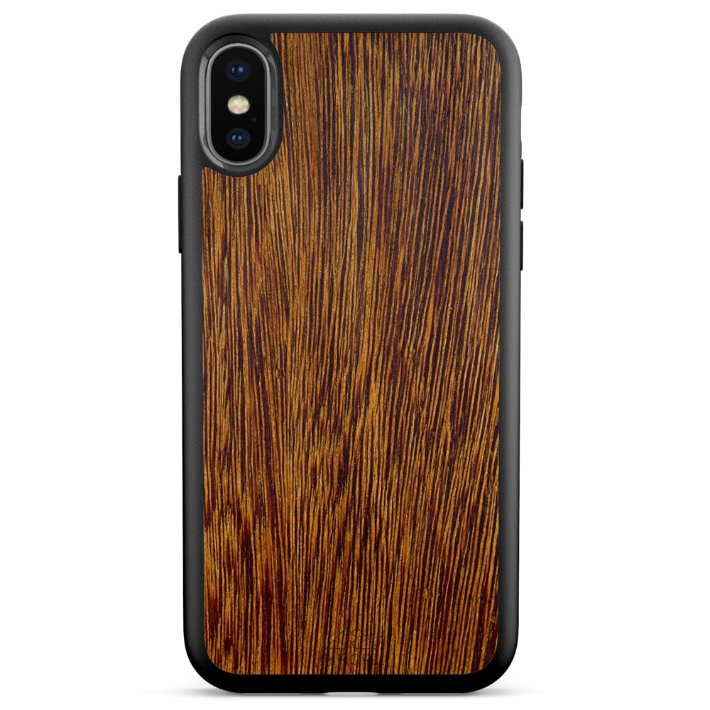 Sucupira wooden phone case held in hand, showcasing its unique grain and finish.