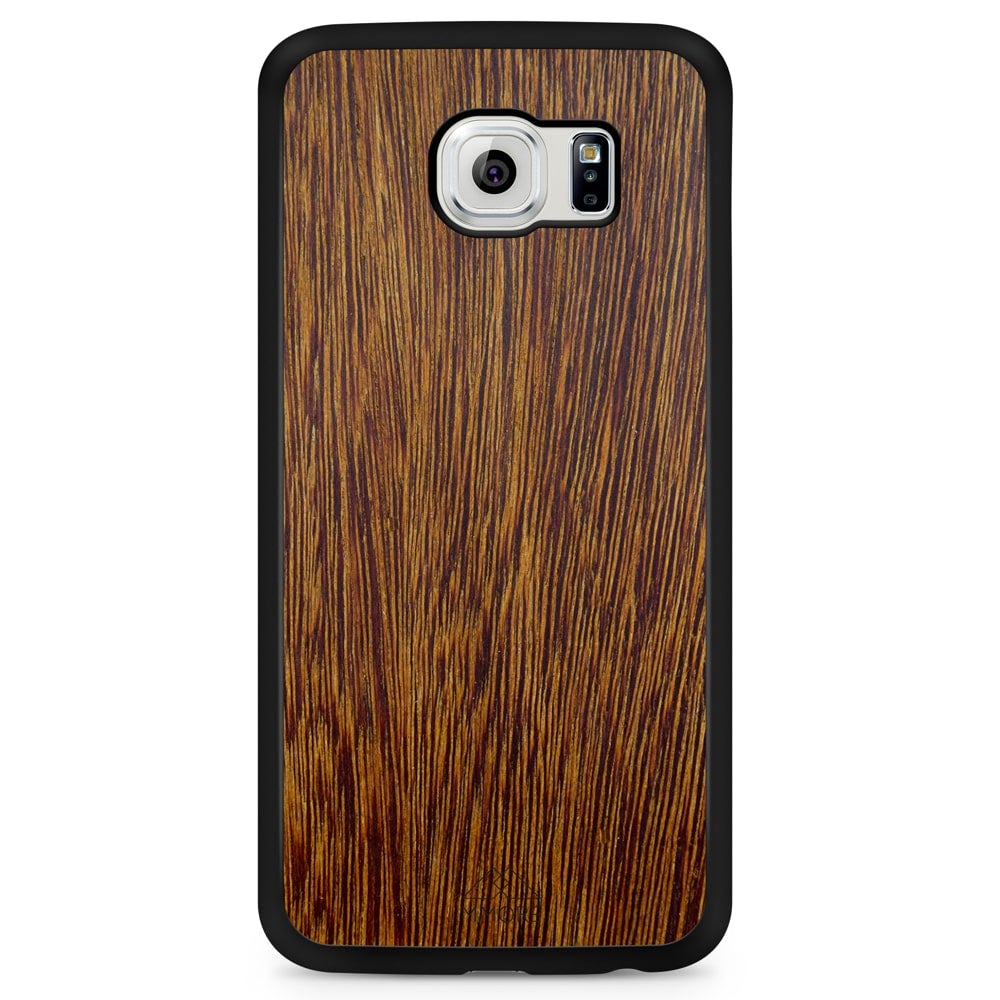 Sucupira wooden phone case held in hand, showcasing its unique grain and finish.