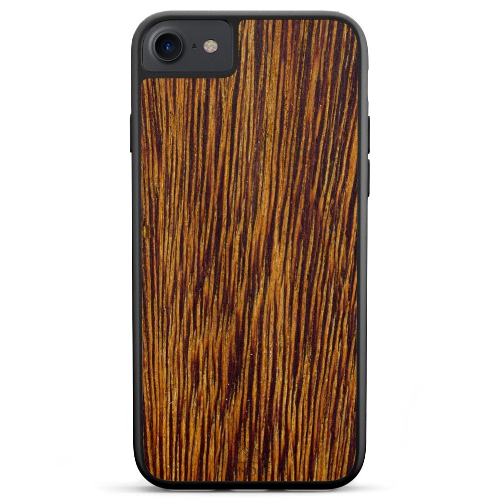 Sucupira wooden phone case held in hand, showcasing its unique grain and finish.