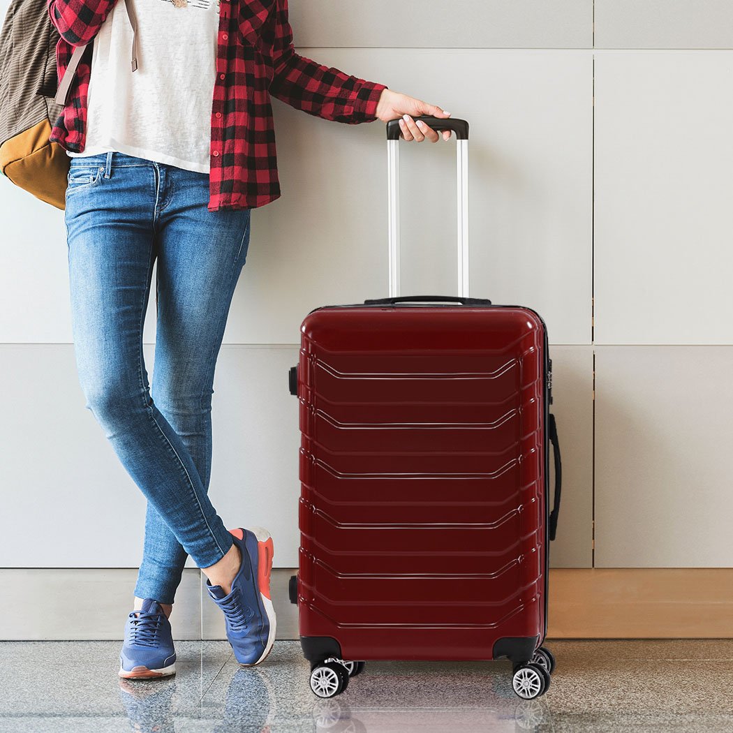 A stylish 3-piece suitcase luggage set in red, featuring hard cover, dual wheels, and TSA-approved locks for secure travel.