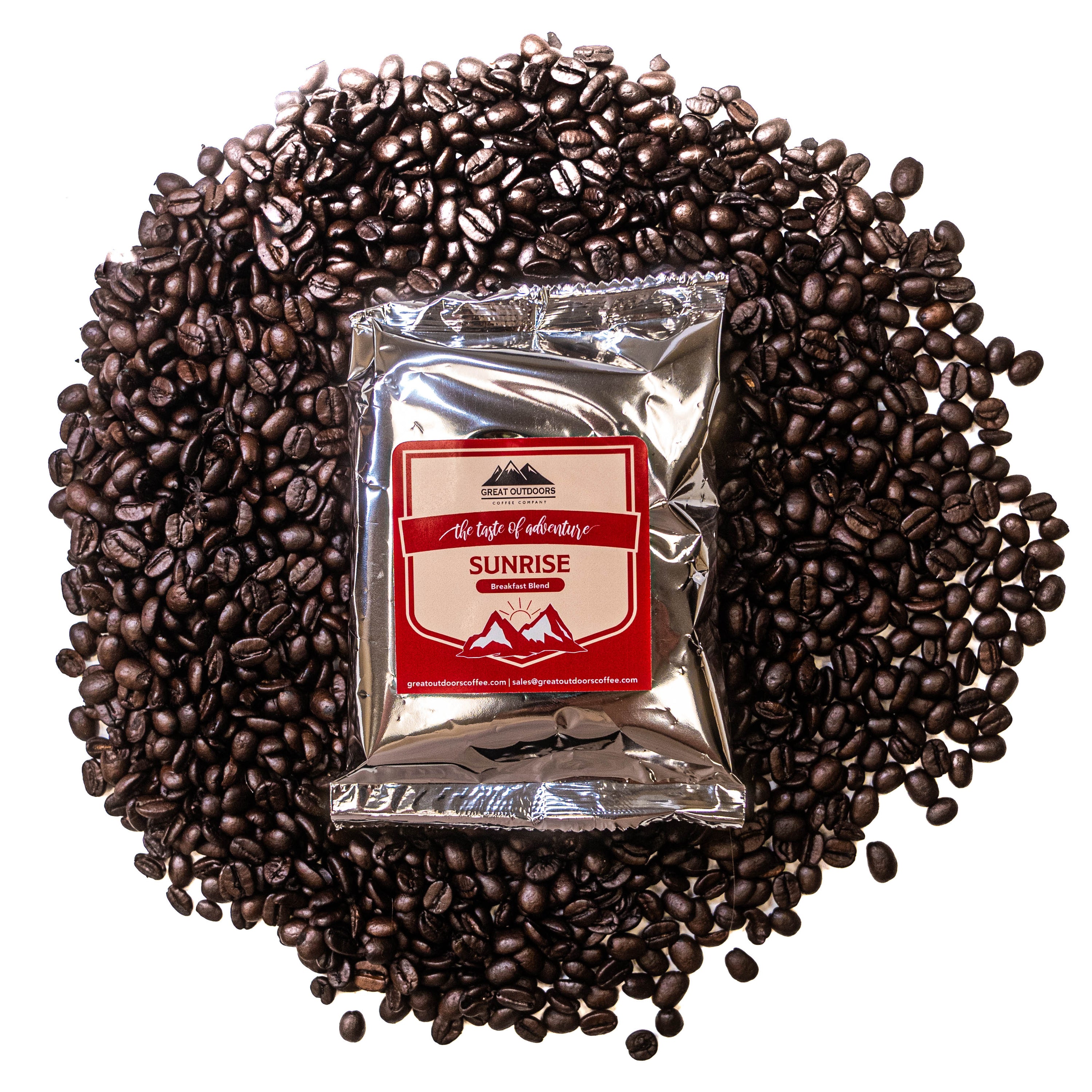 A bag of Sunrise Decaf coffee blend featuring Central American beans with hints of orange and caramel.