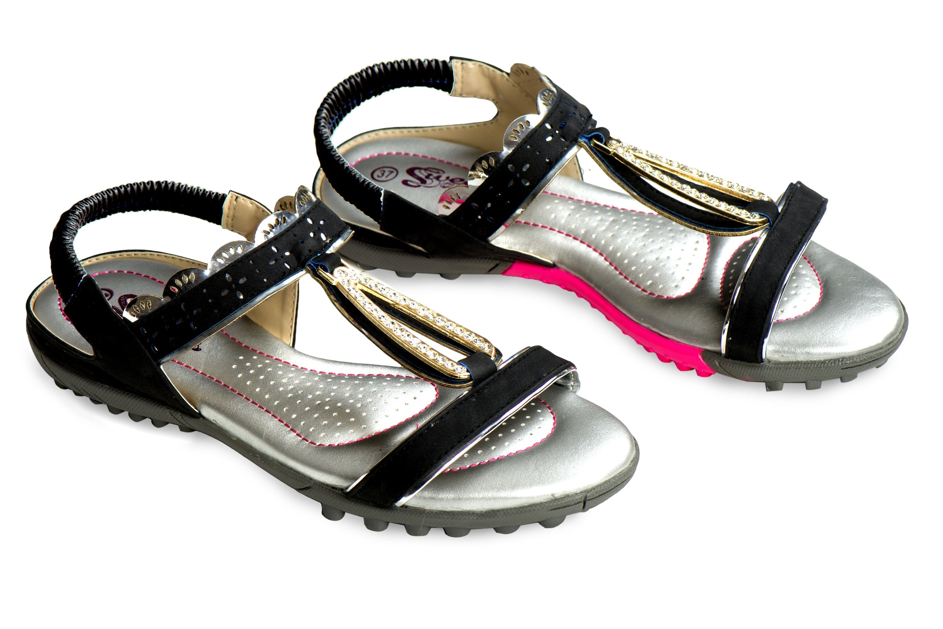 A pair of stylish Sweet Sandals featuring a slip-on design with pink stitching and faux jewel embellishments, perfect for golf or walking.