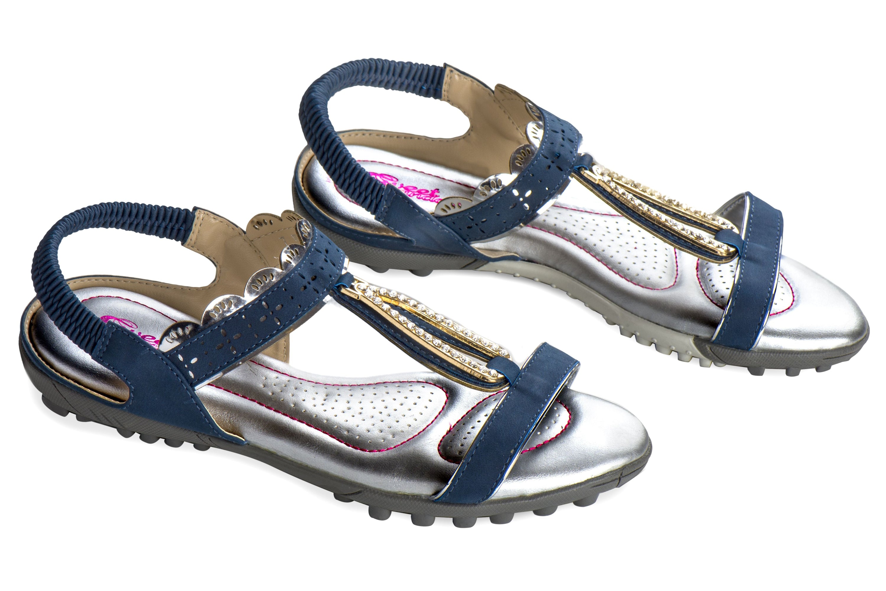 A pair of stylish Sweet Sandals featuring a slip-on design with pink stitching and faux jewel embellishments, perfect for golf or walking.