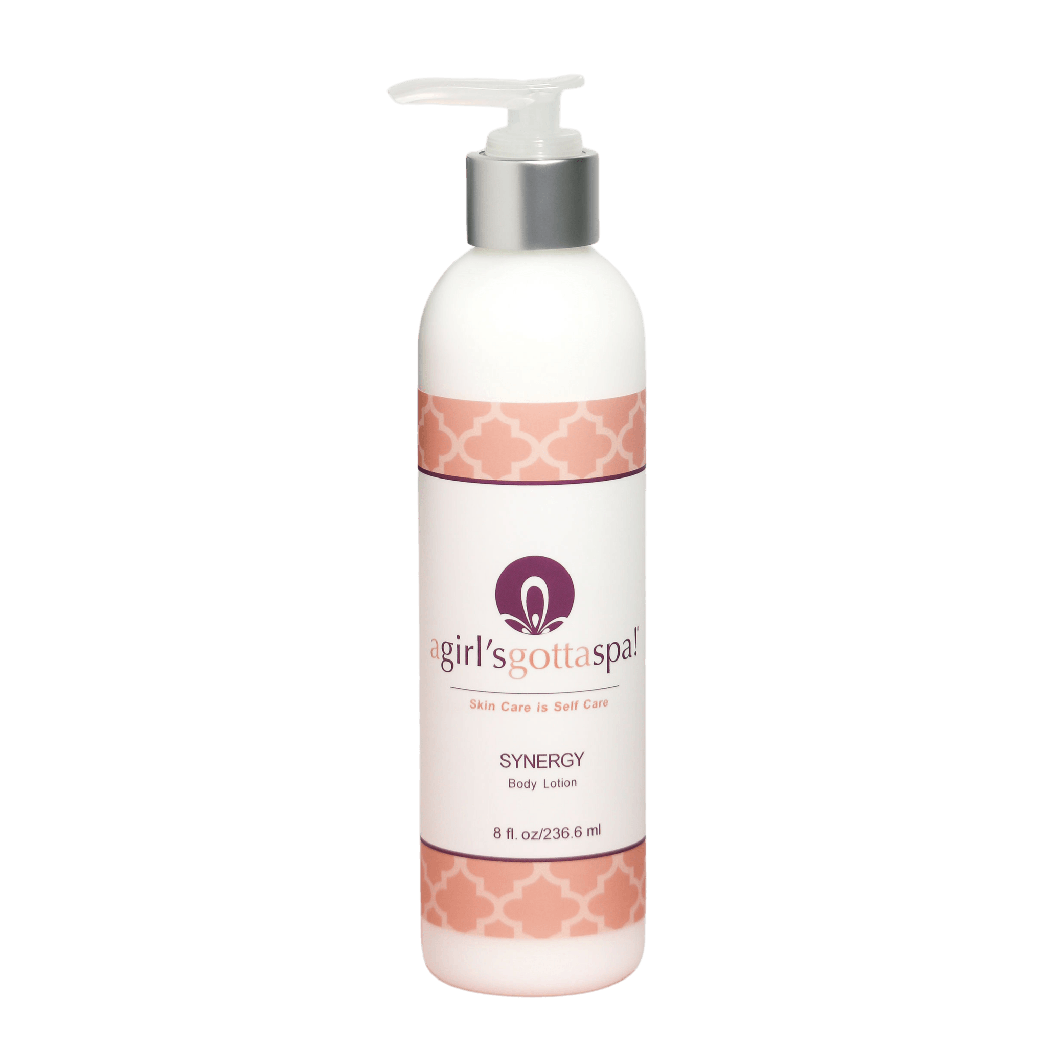 A bottle of Synergy Body Lotion surrounded by lavender and cocoa butter, showcasing its natural ingredients.