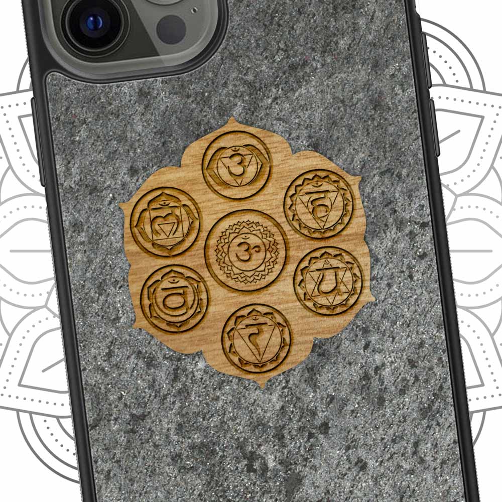 The Seven Chakra Symbols Mountain Stone phone case showcasing natural organic materials with chakra designs.