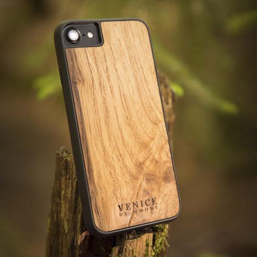 Handcrafted Venice case made from ancient oak wood with minimalist lettering design, showcasing its unique texture and craftsmanship.