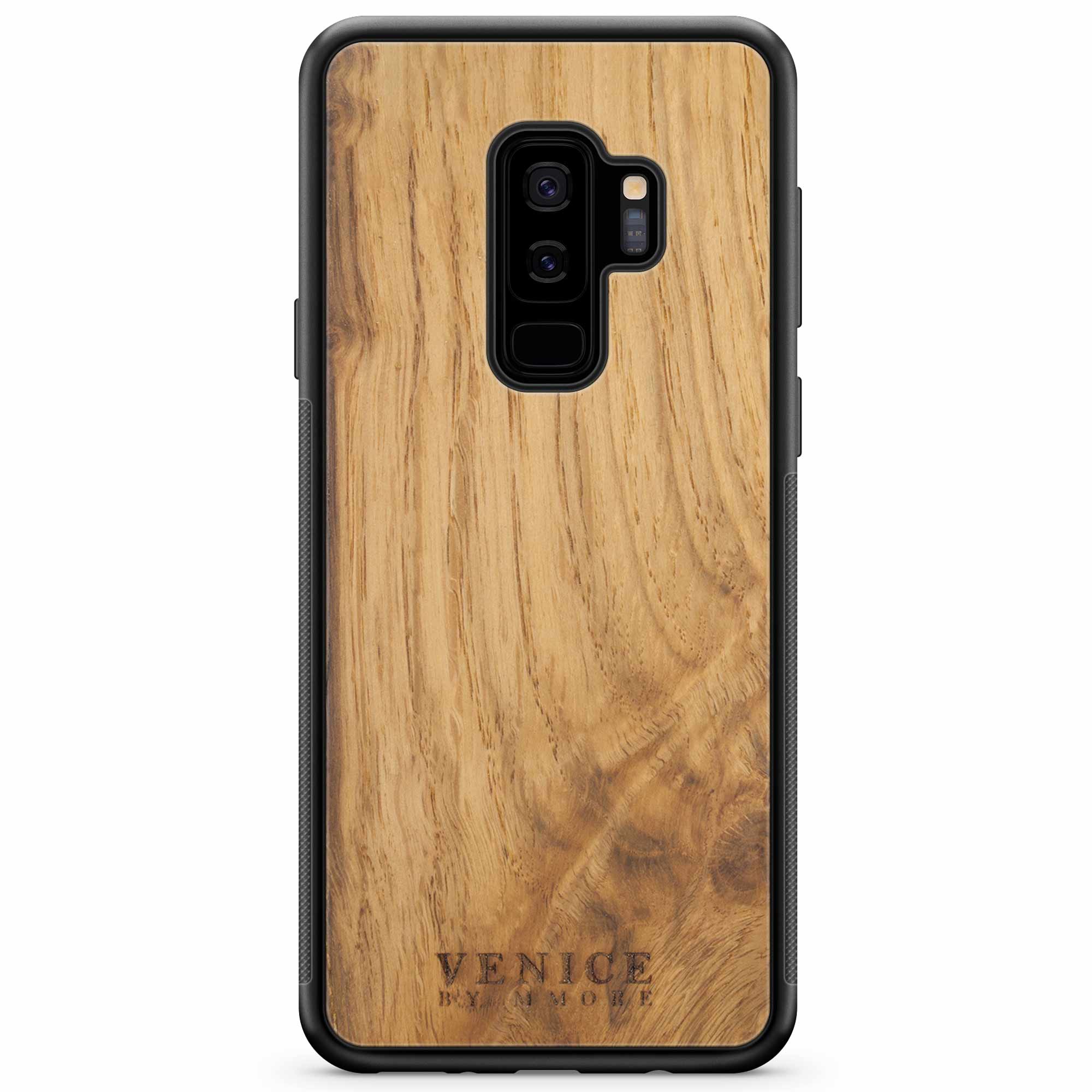 Handcrafted Venice case made from ancient oak wood with minimalist lettering design, showcasing its unique texture and craftsmanship.