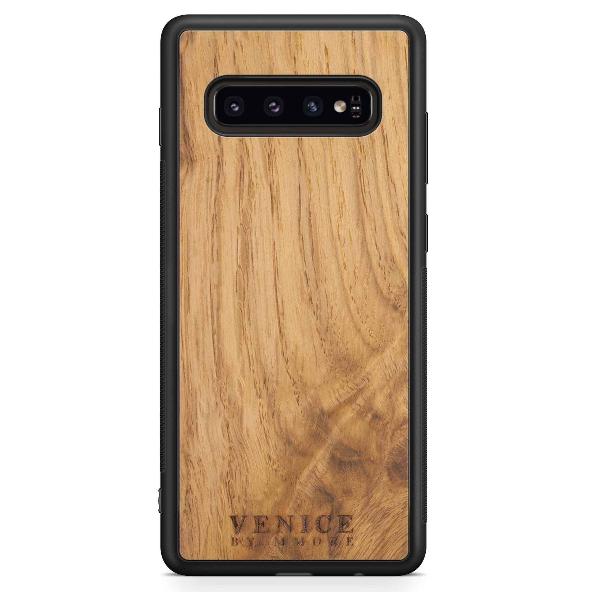 Handcrafted Venice case made from ancient oak wood with minimalist lettering design, showcasing its unique texture and craftsmanship.