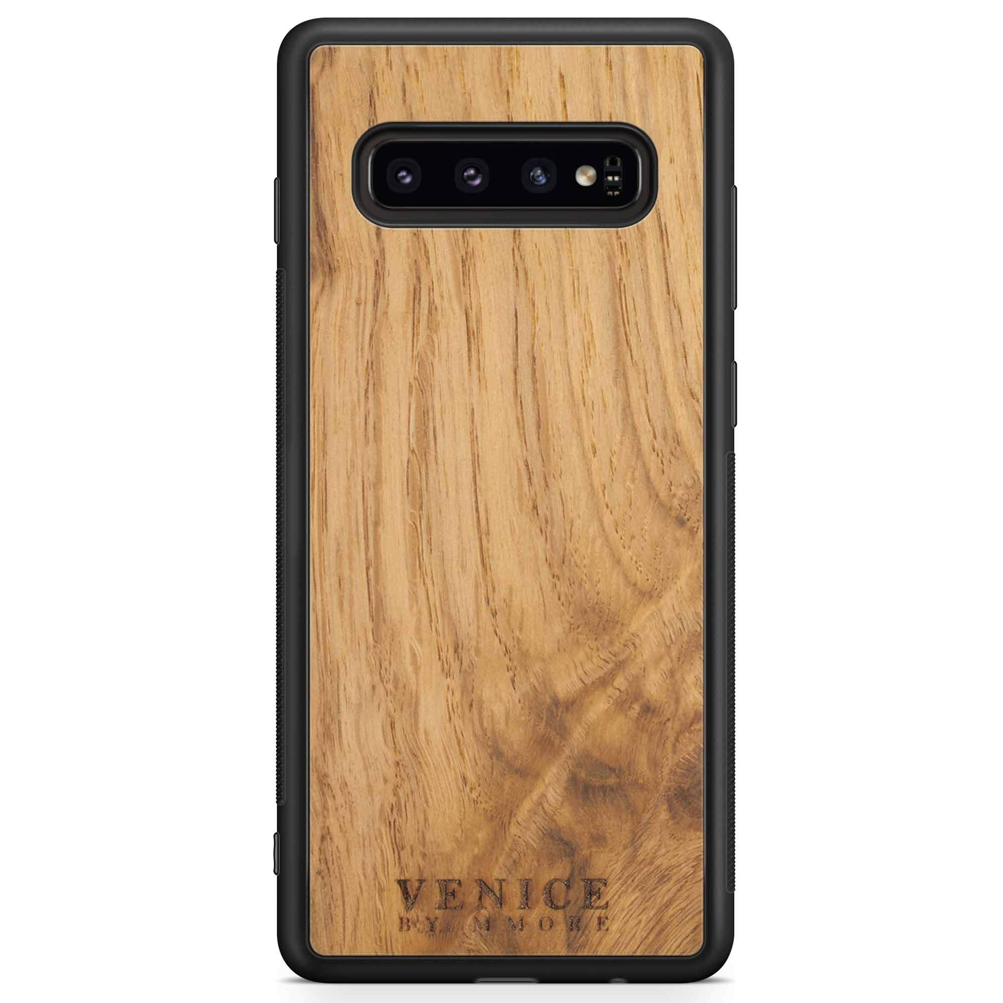 Handcrafted Venice case made from ancient oak wood with minimalist lettering design, showcasing its unique texture and craftsmanship.