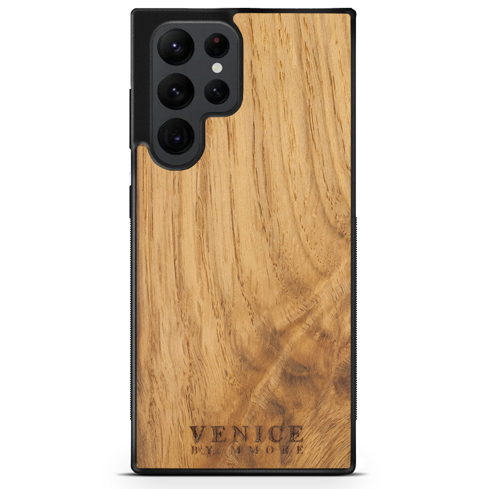 Handcrafted Venice case made from ancient oak wood with minimalist lettering design, showcasing its unique texture and craftsmanship.