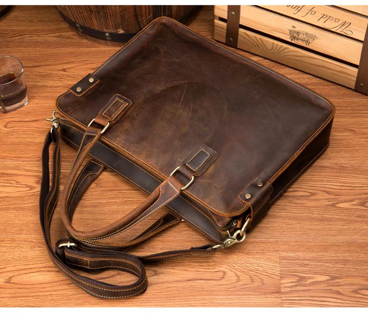 The Viggo Briefcase, a genuine leather messenger bag, showcasing its sleek design, spacious compartments, and high-quality crazy horse leather finish.