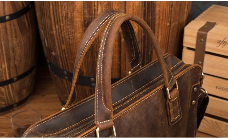 The Viggo Briefcase, a genuine leather messenger bag, showcasing its sleek design, spacious compartments, and high-quality crazy horse leather finish.