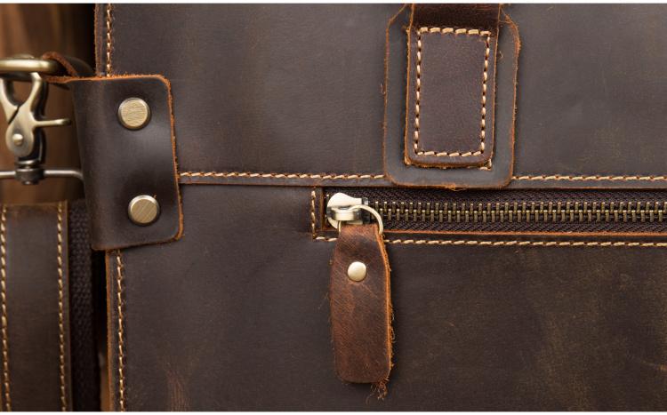 The Viggo Briefcase, a genuine leather messenger bag, showcasing its sleek design, spacious compartments, and high-quality crazy horse leather finish.