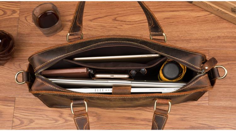 The Viggo Briefcase, a genuine leather messenger bag, showcasing its sleek design, spacious compartments, and high-quality crazy horse leather finish.