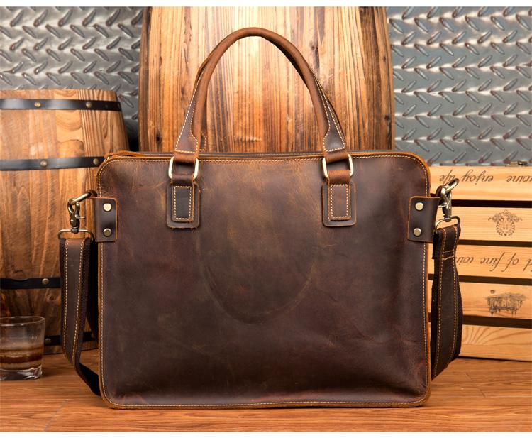 The Viggo Briefcase, a genuine leather messenger bag, showcasing its sleek design, spacious compartments, and high-quality crazy horse leather finish.