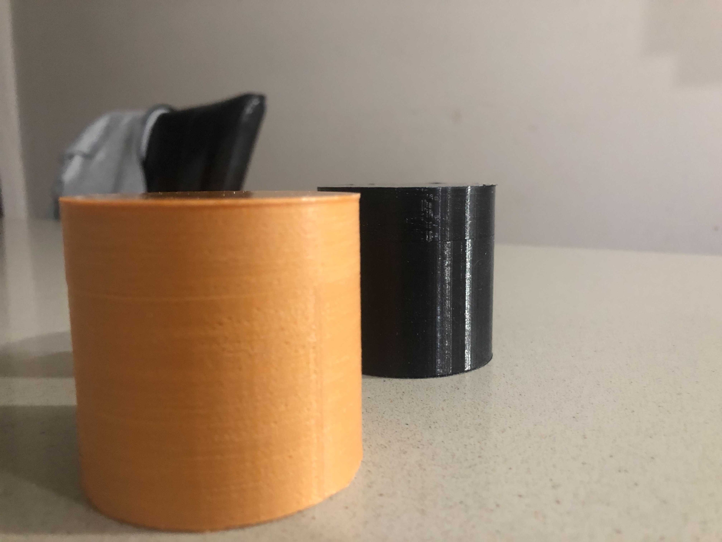 A lightweight and portable Threaded Container, measuring 6cm x 6cm x 6.98cm, designed for storing small items with smooth surfaces for easy handling.