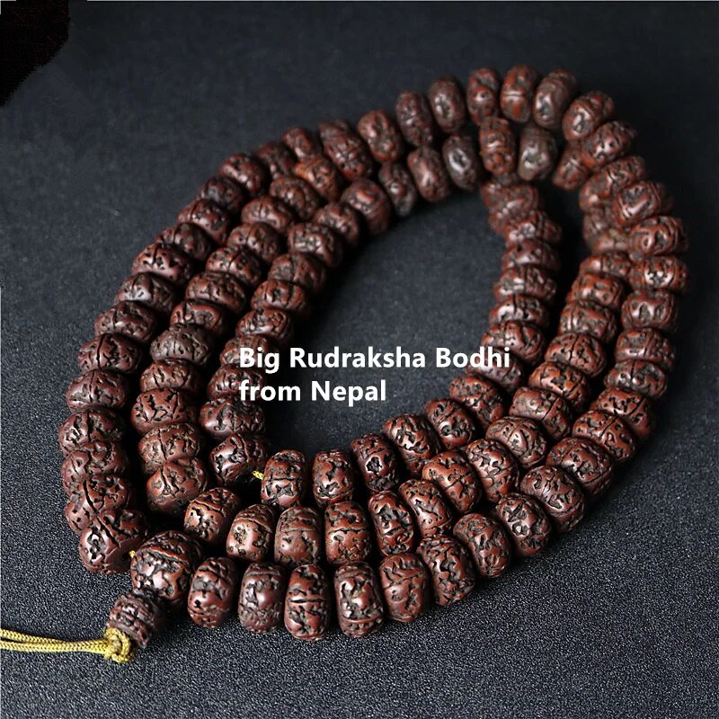 Tibetan Buddhist Mala featuring 108 big oiled Rudraksha and Bodhi beads, designed for meditation and spiritual practices.