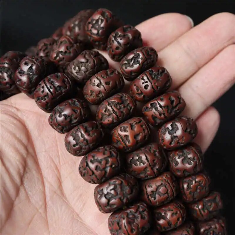 Tibetan Buddhist Mala featuring 108 big oiled Rudraksha and Bodhi beads, designed for meditation and spiritual practices.